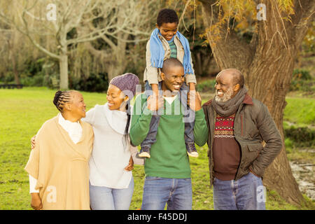 Extended family posing with warm clothes Stock Photo