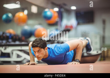 Fit man working out in studio Stock Photo