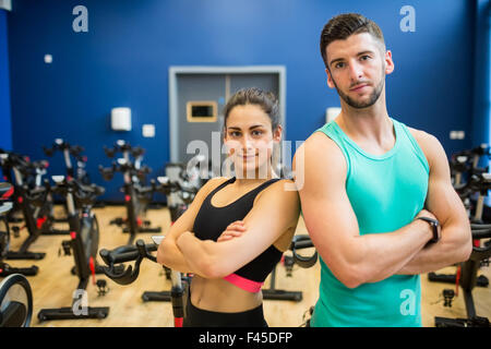 Focused couple working out together Stock Photo