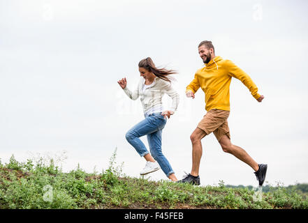 Couple jogging on a hike Stock Photo