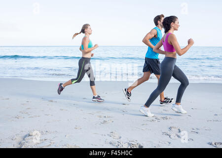 Friends doing jogging together Stock Photo