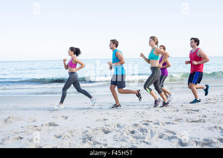Friends doing jogging together Stock Photo