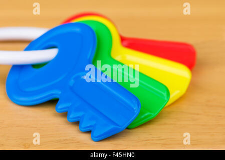 A close up shot of four colorful kid's toy keys. Stock Photo