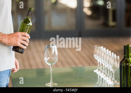 Happy friends in a wine tasting having wine Stock Photo