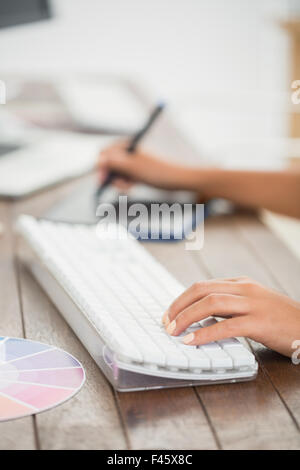 Graphic designer using a graphics tablet Stock Photo