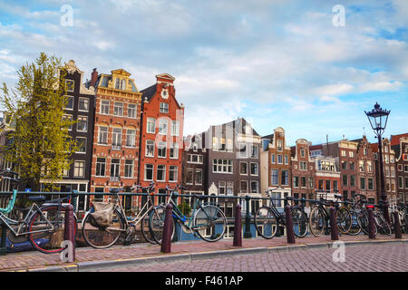 Bicycles parked on a bridge in Amsterdam Stock Photo