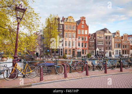 Bicycles parked on a bridge in Amsterdam Stock Photo