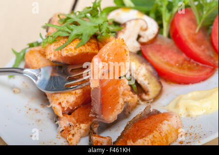 grilled samon filet with vegetables salad Stock Photo