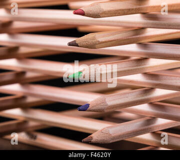 creatively stacked color pencils Stock Photo