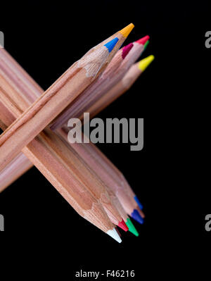 creatively stacked color pencils Stock Photo