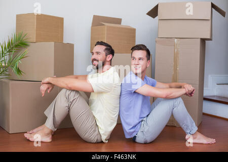 Happy homosexual couple looking away Stock Photo