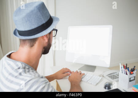 Handsome man working on computer Stock Photo
