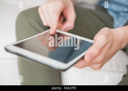 Close up of man using tablet Stock Photo