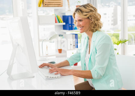Young smiling businesswoman working Stock Photo