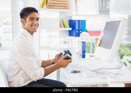 Young smiling businessman looking at the camera Stock Photo