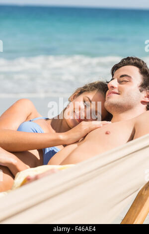 Happy couple napping together in the hammock Stock Photo