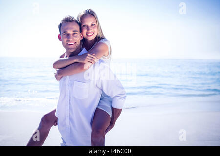 Happy couple having fun on the beach Stock Photo