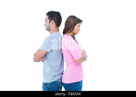 Angry couple standing back to back Stock Photo