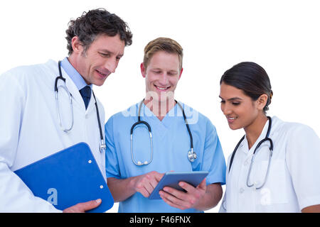 Doctors and nurses using laptop Stock Photo