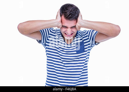 Angry hipster with hands on head Stock Photo