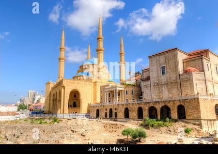 A view of the Saint George Maronite Cathedral and the Mohammad Al-Amin Mosque at the historic centre of Beirut, in Lebanon, down Stock Photo