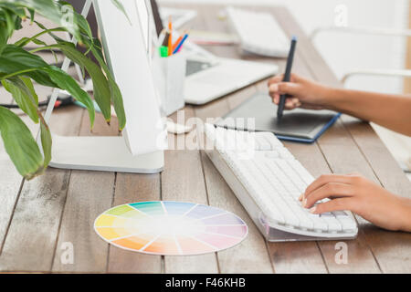 Graphic designer using a graphics tablet Stock Photo