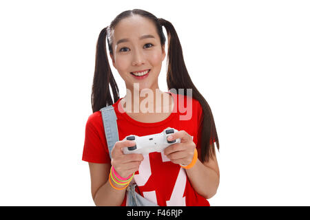 Young woman holding camera Stock Photo