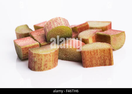 chopped red rhubarb on white background Stock Photo