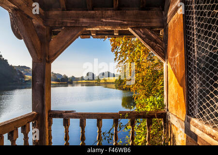 View from the boathouse onto the lake on the  Bowood Estate in Wiltshire. Stock Photo