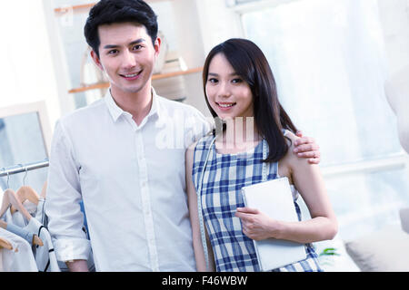 Young man and young woman in design studio Stock Photo