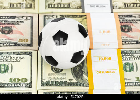 Money and soccer ball Stock Photo