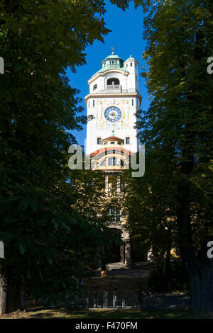 Muellersches Volksbad public swimming pool clock tower on the Isar river, Munich, Bavaria, Germany, Europe Stock Photo