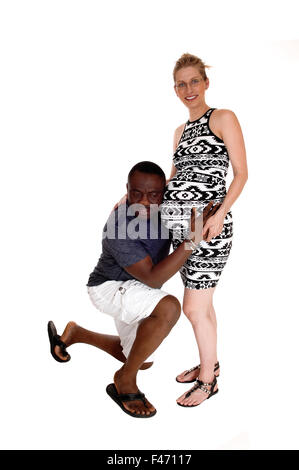 Black man with pregnant Caucasian wife. Stock Photo