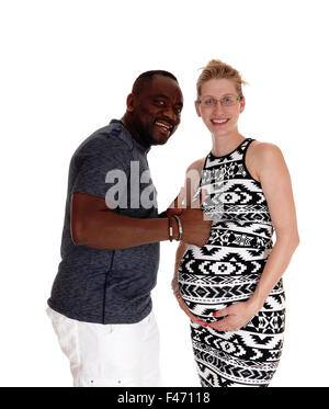 Happy white woman pregnant, black man. Stock Photo