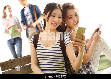 Young people using smart phone Stock Photo