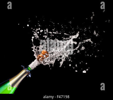 closeup of popping champagne and splash Stock Photo