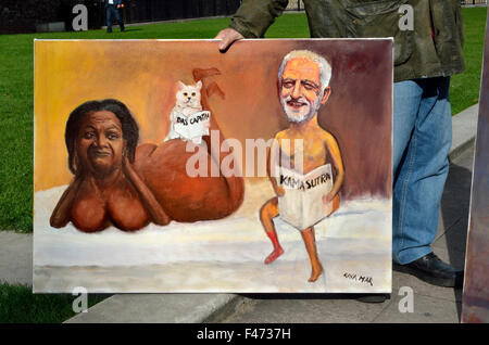 Satirical artist Kaya Mar outside the Houses of Parliament with caricatures of Jeremy Corbyn and Diane Abbott Stock Photo