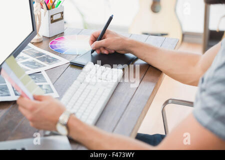 Graphic designer using a graphics tablet Stock Photo