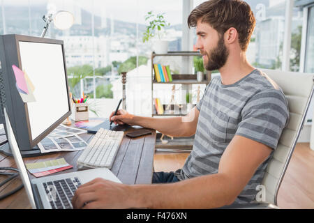 Graphic designer using a graphics tablet Stock Photo