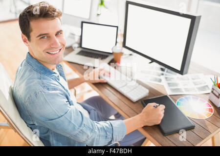 Graphic designer using a graphics tablet Stock Photo