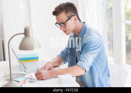 Happy handsome man working Stock Photo