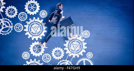 Composite image of leaping businessman Stock Photo