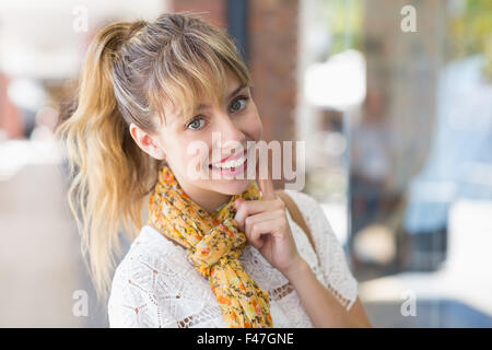 Smiling woman looking at camera Stock Photo