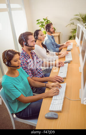 Call centre colleagues at work Stock Photo