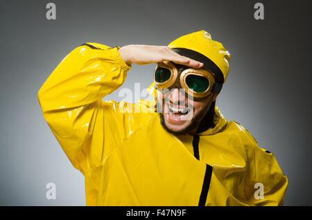 Man wearing yellow suit and aviator glasses Stock Photo