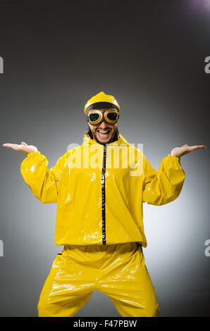 Man wearing yellow suit and aviator glasses Stock Photo