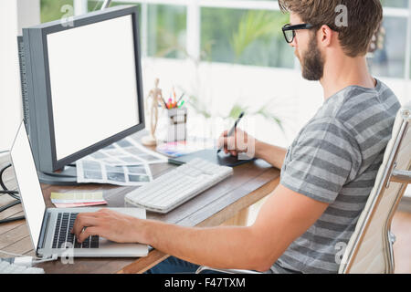 Graphic designer using a graphics tablet Stock Photo