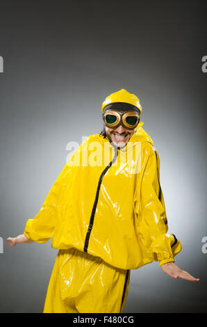 Man wearing yellow suit and aviator glasses Stock Photo