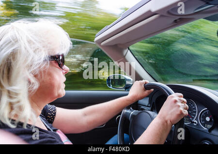 Beautiful Woman Driving Convertible Car