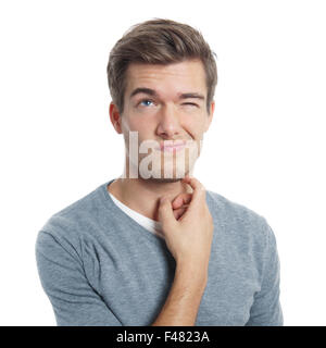 young man scratching his head Stock Photo